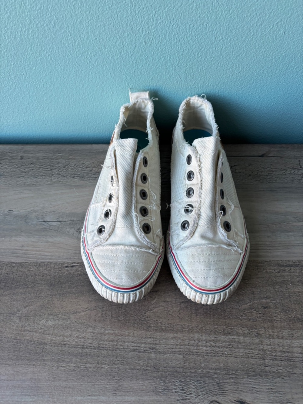 Casual White Canvas Slip-On Sneakers with Red and Blue Stripe